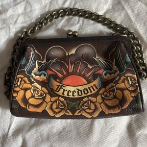 Isabella Fiore Brown Leather Clutch with Freedom Design